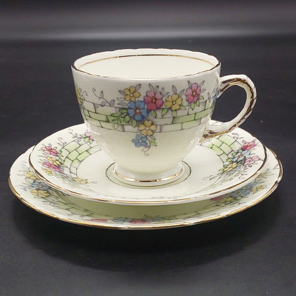 Sutherland - Colourful Flowers on Brick Band - Trio