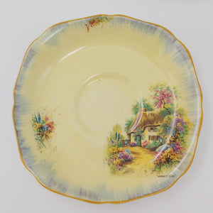 Hollinshead & Kirkham - Homestead on Yellow with Blue Rim - Saucer